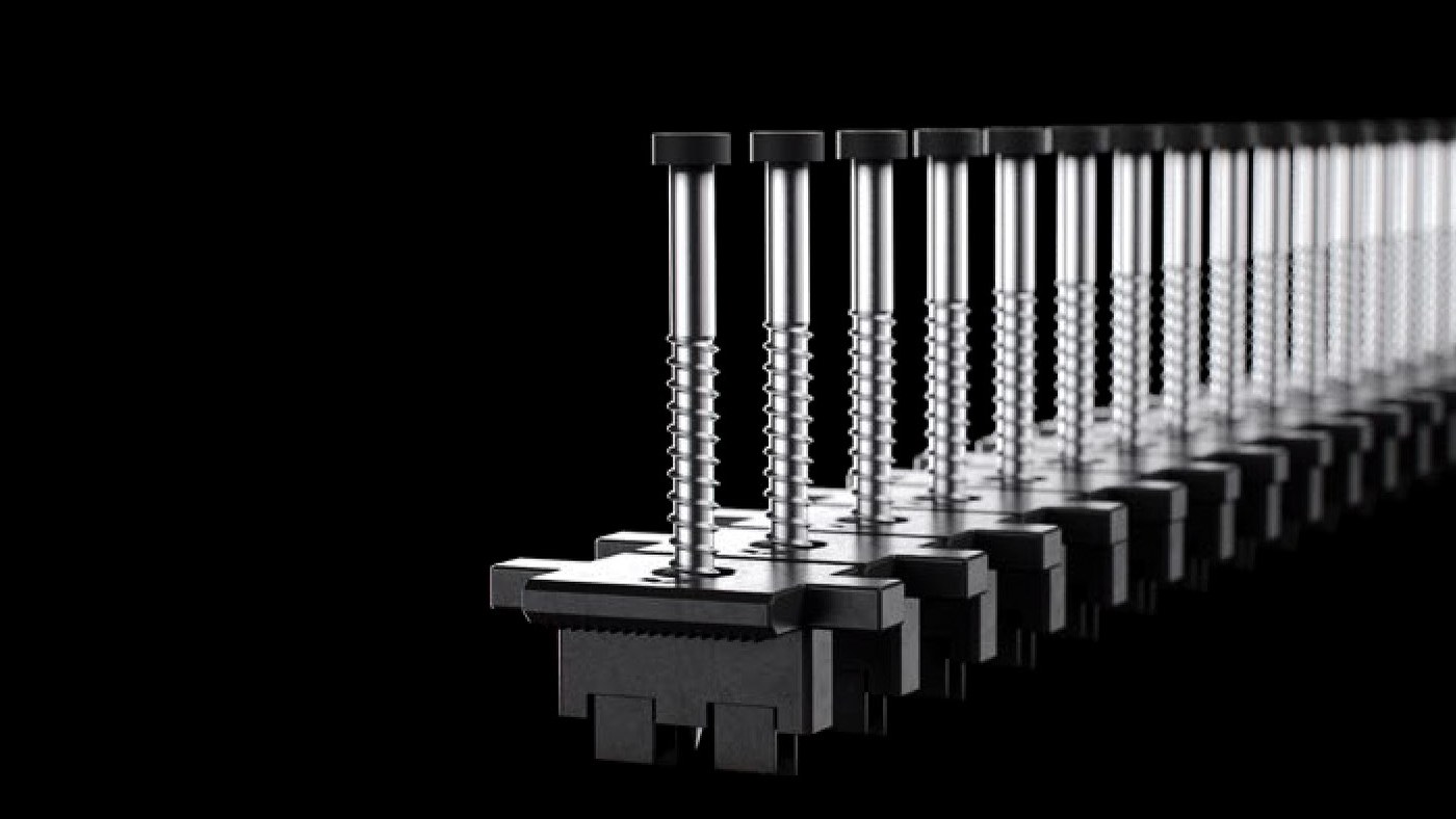 Starborn Clip&Rip universal hidden deck clips collated into a strip on a black background, each black polymer clip pre-loaded with a long stainless steel screw, with serrated compression tabs visible on the underside of the nearest clip