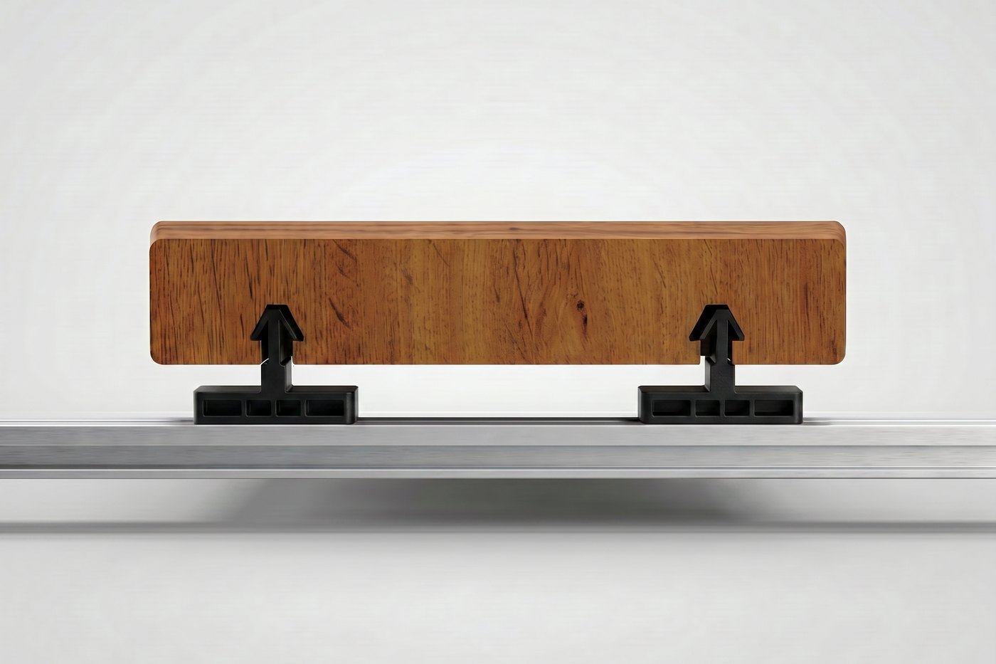 Cross-section view of a grooved wood-grain PVC deck board seated on two black InvisiClip polymer clips that are snapped into a brushed aluminum rail, with a visible air gap between the underside of the board and the top of the rail