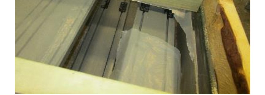 Typical failure mode: plastic clip releasing from aluminum rail at end of test, board and joists remained intact.